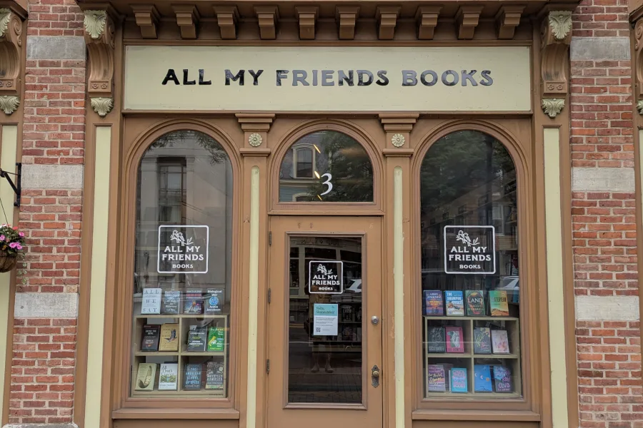 The Skaneateles shopfront of All My Friends Books at 3 E Genesee Street